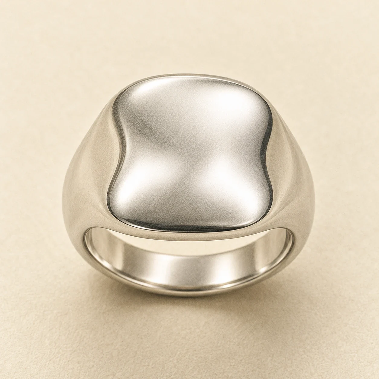 Sculptural pocket ring with a shallow hollow face